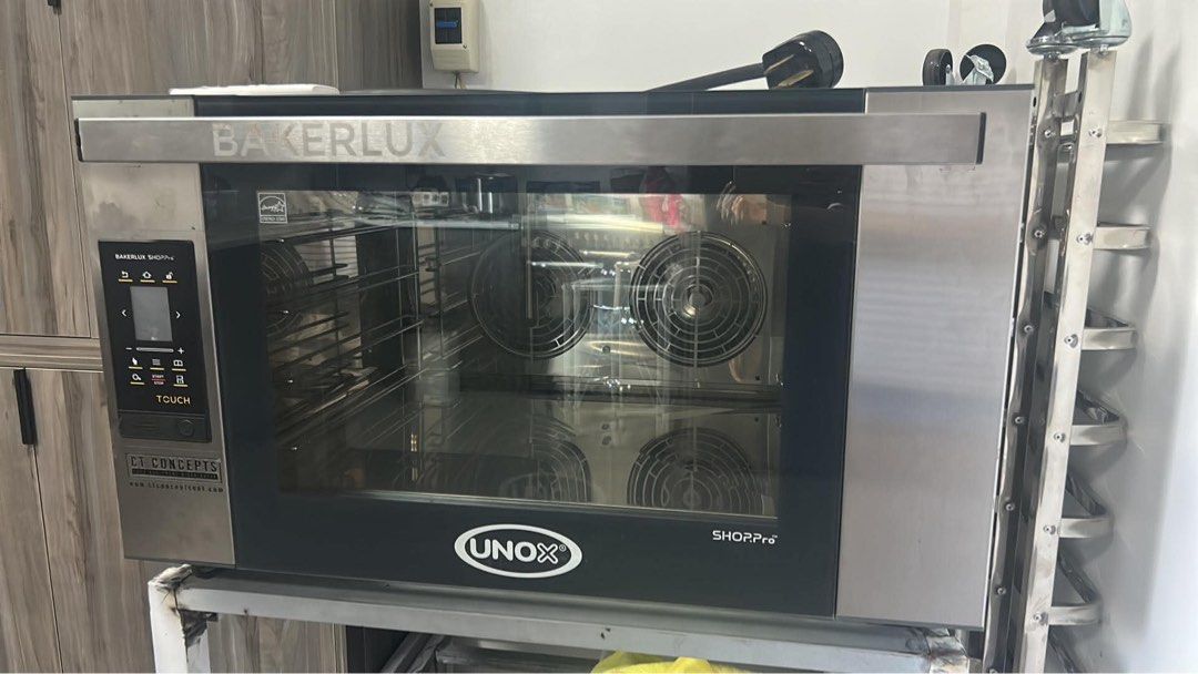 Bakerlux UNOX SHOPPro Combi Oven (Category: Ovens & Toasters) located in Makati City. Submitted by goodconditionguaranteed (Listing ID 1452982355, Image 2). Description: - Bakerlux UNOX SHOPPro combi oven - Stainless steel interior - Multiple fan settings for even cooking - Digital touch screen controls - Ideal for bakeries or restaurants - Ready for a new kitchen.