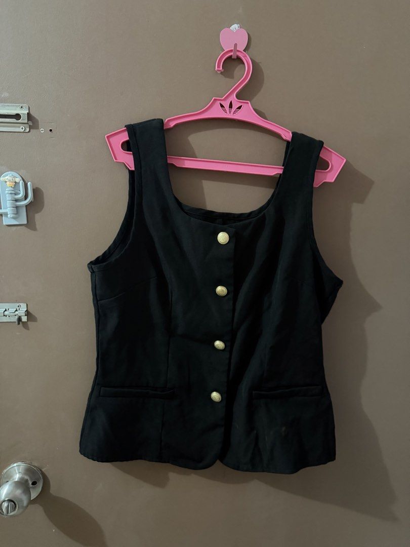 Black Sleeveless Vest with Gold Buttons (Category: Sleeveless) located in Davao. Submitted by fabdeclutter (Listing ID 1453046667, Image 2). Description: - Black sleeveless vest - Square neckline - Four gold button details - Two front pocket details - Classic and versatile piece for layering.