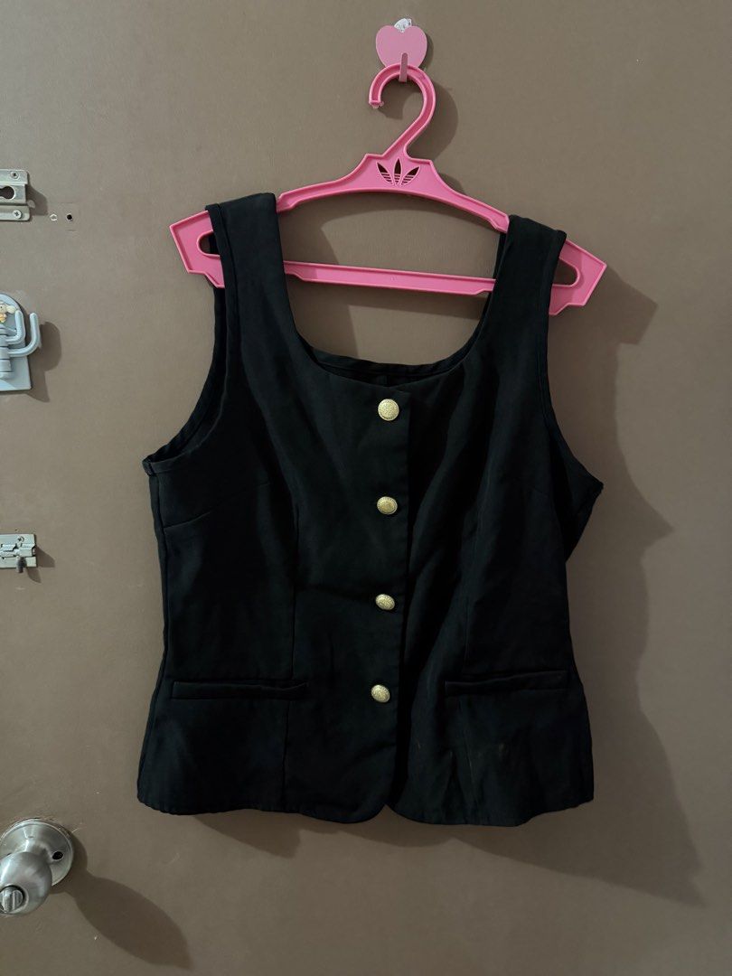 Black Sleeveless Vest with Gold Buttons (Category: Sleeveless) located in Davao. Submitted by fabdeclutter (Listing ID 1453046667, Image 1). Description: - Black sleeveless vest - Square neckline - Four gold button details - Two front pocket details - Classic and versatile piece for layering.