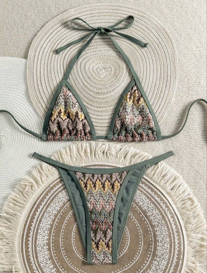 Boho Textured Triangle Bikini Set (Category: Bikinis & Swimsuits) located in Manila. Submitted by mnlclaudia (Listing ID 1452977110, Image 1). Description: - Cute boho-style bikini set - Textured triangle top with adjustable tie straps - Cheeky cut bottoms - Earthy tones with pink and yellow accents - Ideal for beach days or pool parties.