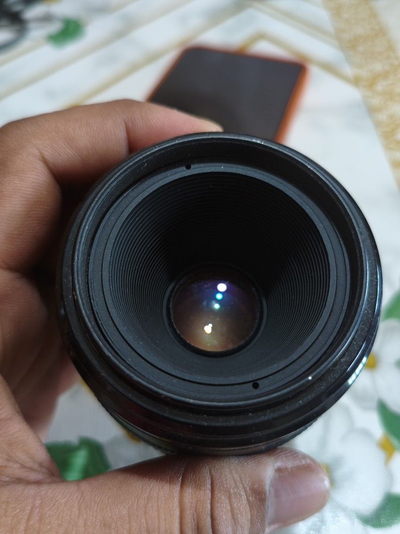 Canon EF 50mm f/2.5 Compact Macro Lens (Category: Lens & Kits) located in Bauang. Submitted by jerwinpere15921 (Listing ID 1452891190, Image 2). Description: - Canon EF 50mm f/2.5 lens working autofocus - Ideal for portraits and close-up shots - Minimum focus distance: 0.45m - Note: slight fungus on rear element (does not affect image quality) - Sold as is.