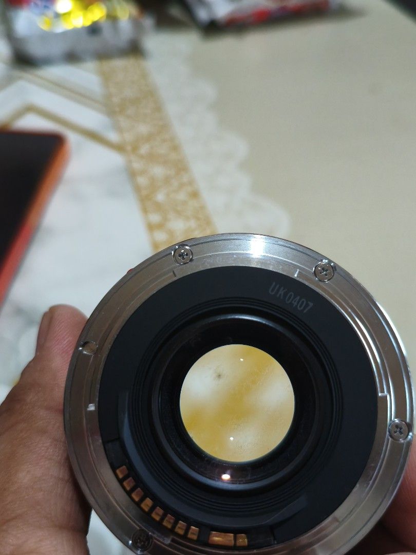 Canon EF 50mm f/2.5 Compact Macro Lens (Category: Lens & Kits) located in Bauang. Submitted by jerwinpere15921 (Listing ID 1452891190, Image 3). Description: - Canon EF 50mm f/2.5 lens working autofocus - Ideal for portraits and close-up shots - Minimum focus distance: 0.45m - Note: slight fungus on rear element (does not affect image quality) - Sold as is.
