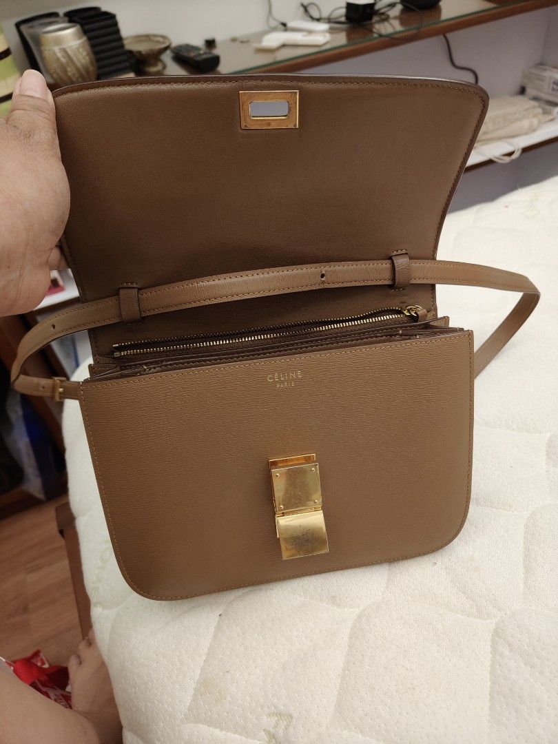 Celine Box Bag Taupe Leather (Category: Luxury Bags & Wallets) located in Pasay City. Submitted by janiell (Listing ID 1452991731, Image 2). Description: - Authentic Celine Box Bag - Color: Taupe - Material: Textured Leather - Hardware: Gold-tone - Closure: Clasp - Interior: Zip pocket and card slots - Includes: Dust bag - Ideal for: Everyday use.