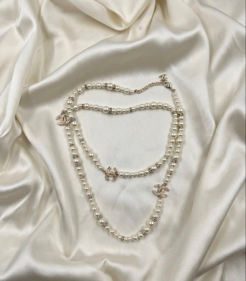 ⚜️Chanel Double layer necklace (Category: Luxury Accessories) located in Makati City. Submitted by 90sangel (Listing ID 1453042111, Image 3). Description: Pure Parisian Glamour — Chanel Double Pearl Motif Necklace ⚜️ •Condition: Excellent & Giftable! *Complete with paperbag, camellia and ribbons.