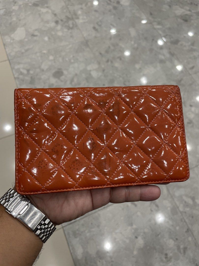 Chanel Quilted Long Flap Wallet (Category: Luxury Bags & Wallets) located in Calapan. Submitted by lucasthrifts (Listing ID 1452911737, Image 2). Description: -Authentic Chanel Quilted long flap wallet (orange) -With sign of usage -Lampo under zip -15500 add sf .