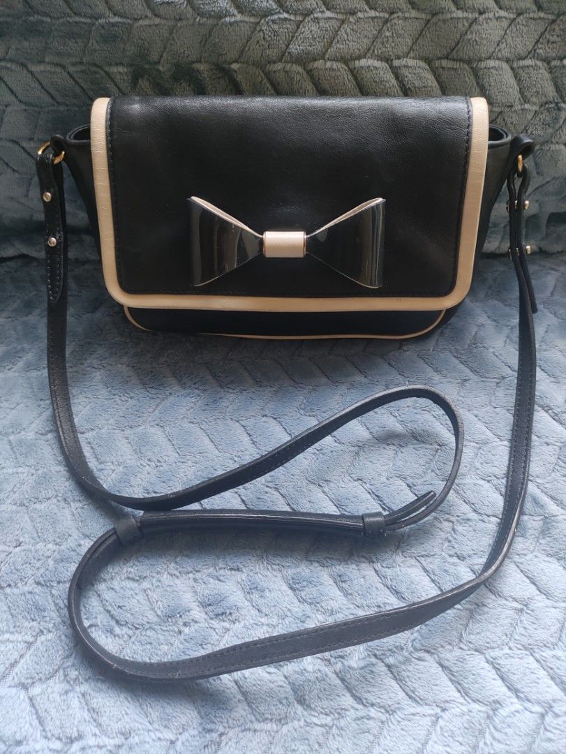 Chloe Black Leather Bow Shoulder Bag (Category: Luxury Bags & Wallets) located in Cainta. Submitted by luxesparkle (Listing ID 1453010772, Image 1). Description: Chloe Sling Bag U.S bought very nice in actual .