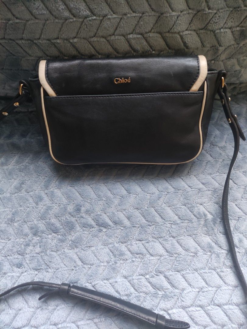 Chloe Black Leather Bow Shoulder Bag (Category: Luxury Bags & Wallets) located in Cainta. Submitted by luxesparkle (Listing ID 1453010772, Image 3). Description: Chloe Sling Bag U.S bought very nice in actual .