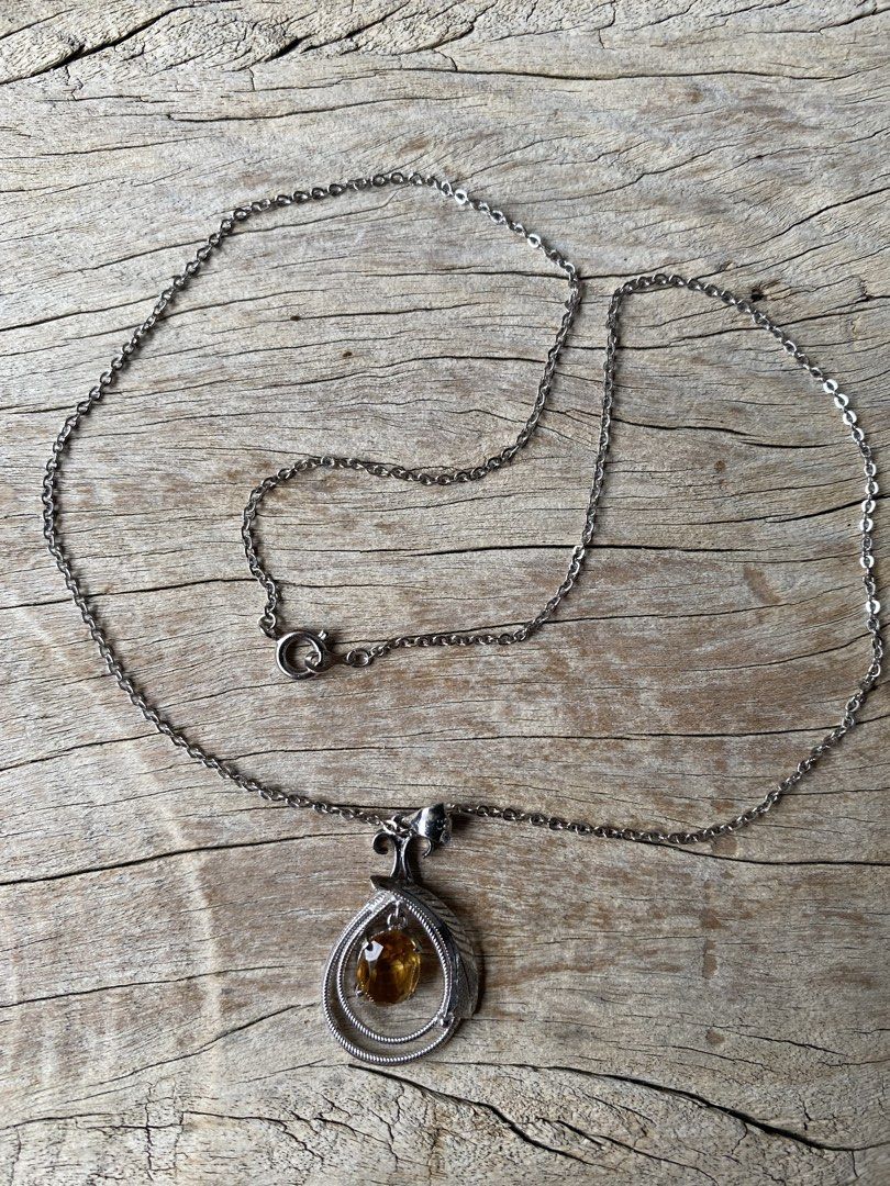 Dainty Citrine Pendant Necklace (Category: Necklaces) located in Cebu City. Submitted by janb85 (Listing ID 1452926483, Image 3). Description: Natural Citrine Teardrop Pendant with Silver marking on the pendant Cute everyday wear .