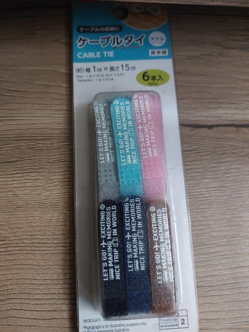 Daiso Cable Ties - Slim Type - 6 Pieces (Category: Chargers & Cables) located in Malaybalay. Submitted by mags_sofia (Listing ID 1452982809, Image 2). Description: - Slim cable ties from Daiso, perfect for organizing wires. - Each pack contains 6 ties in assorted colors: grey, teal, pink, navy, and brown. - Ideal for keeping your cables neat and tidy..