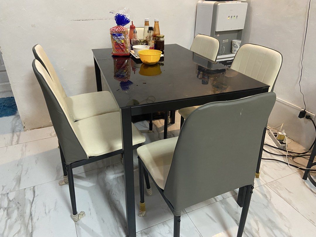 Dining table with 6 chairs (Category: Tables & Sets) located in Quezon City. Submitted by edithrose0917 (Listing ID 1452993403, Image 2). Description: Dining table 6 seaters with 6 chairs slightly used. .