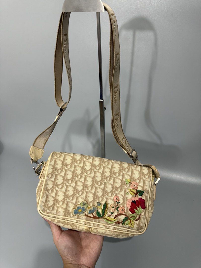 Dior Floral Sling (Category: Luxury Bags & Wallets) located in San Pedro. Submitted by astron_15 (Listing ID 1452945831, Image 2). Description: Authentic Dior Sling Rank B (slight yellowing on edges) 17k only! Louis vuitton , dior , gucci.