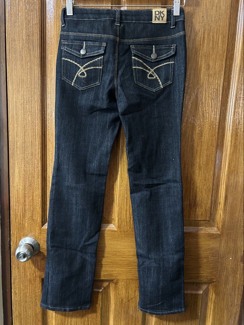 DKNY Dark Wash Denim Jeans Size 14 (Category: Jeans) located in Paranaque City. Submitted by allthatclutterph (Listing ID 1452905154, Image 2). Description: - Brand: DKNY - Color: Dark Wash Denim - Fit: Straight Leg - Closure: Button and Zip Fly - Special Features: Back pockets with button closure and decorative stitching - Origin: Made in China - Size: 14.