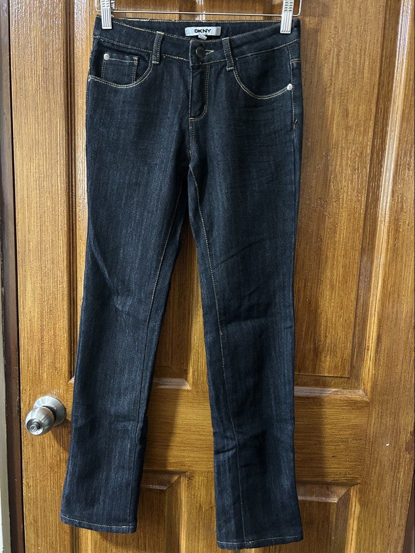 DKNY Dark Wash Denim Jeans Size 14 (Category: Jeans) located in Paranaque City. Submitted by allthatclutterph (Listing ID 1452905154, Image 1). Description: - Brand: DKNY - Color: Dark Wash Denim - Fit: Straight Leg - Closure: Button and Zip Fly - Special Features: Back pockets with button closure and decorative stitching - Origin: Made in China - Size: 14.