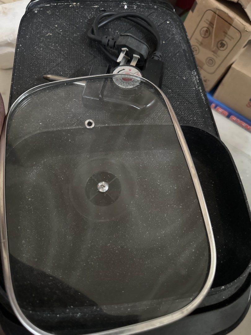 Electric Griddle Pan with Glass Lid (Category: Cookware & Accessories) located in Caloocan City. Submitted by ylieramae201821 (Listing ID 1452959353, Image 1). Description: - Electric griddle pan - Comes with a glass lid - Non-stick cooking surface - Includes power cord and temperature control knob - Works well and ready for a new home.