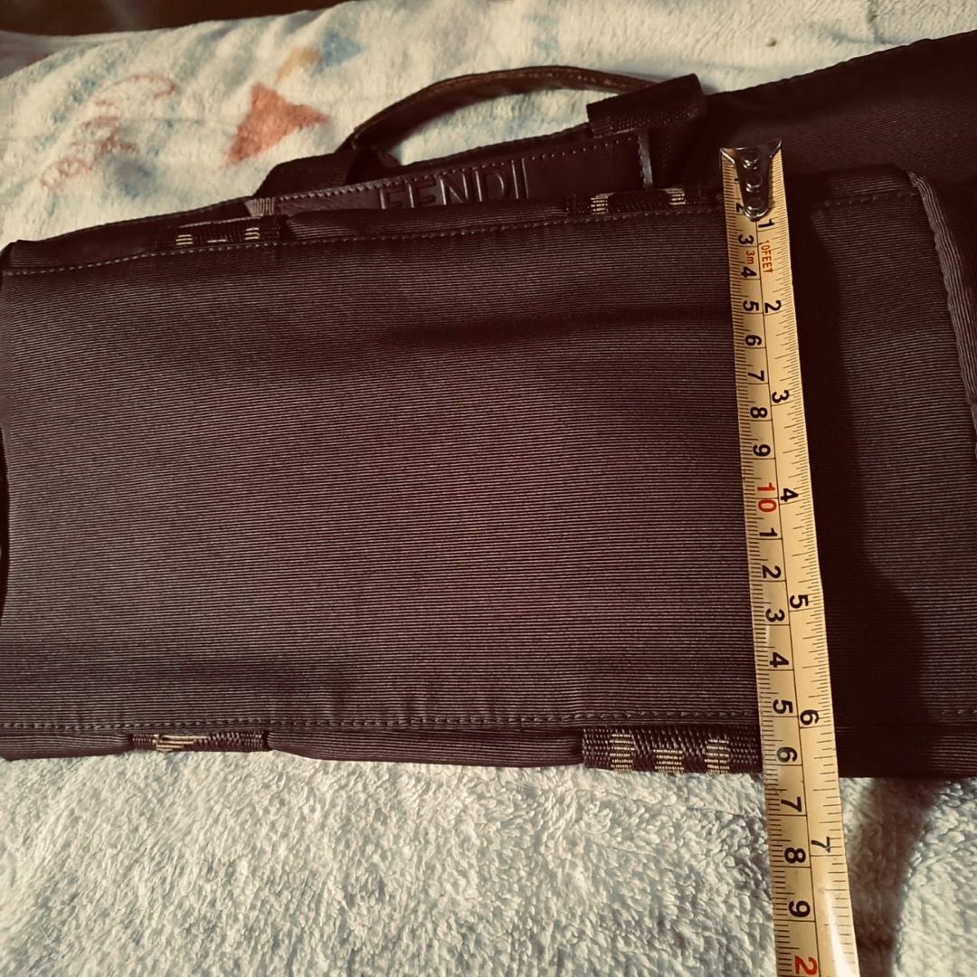 Fendi Roma Monogram Canvas Mini Boston Bag (Category: Luxury Bags & Wallets) located in Pila. Submitted by ester_aurea (Listing ID 1452911633, Image 2). Description: Vintage Fendi Bag Authenticity not guarantee Please check Preloved and well kept Minor issue sa leather chips sa loob No issue sa color materials sa labas , mahirap lang xa kunan tru cp kc nag iiba kulay nya sa photo . NO DISCOLORATION po yan sa actual , pantay po kulay nya sa person