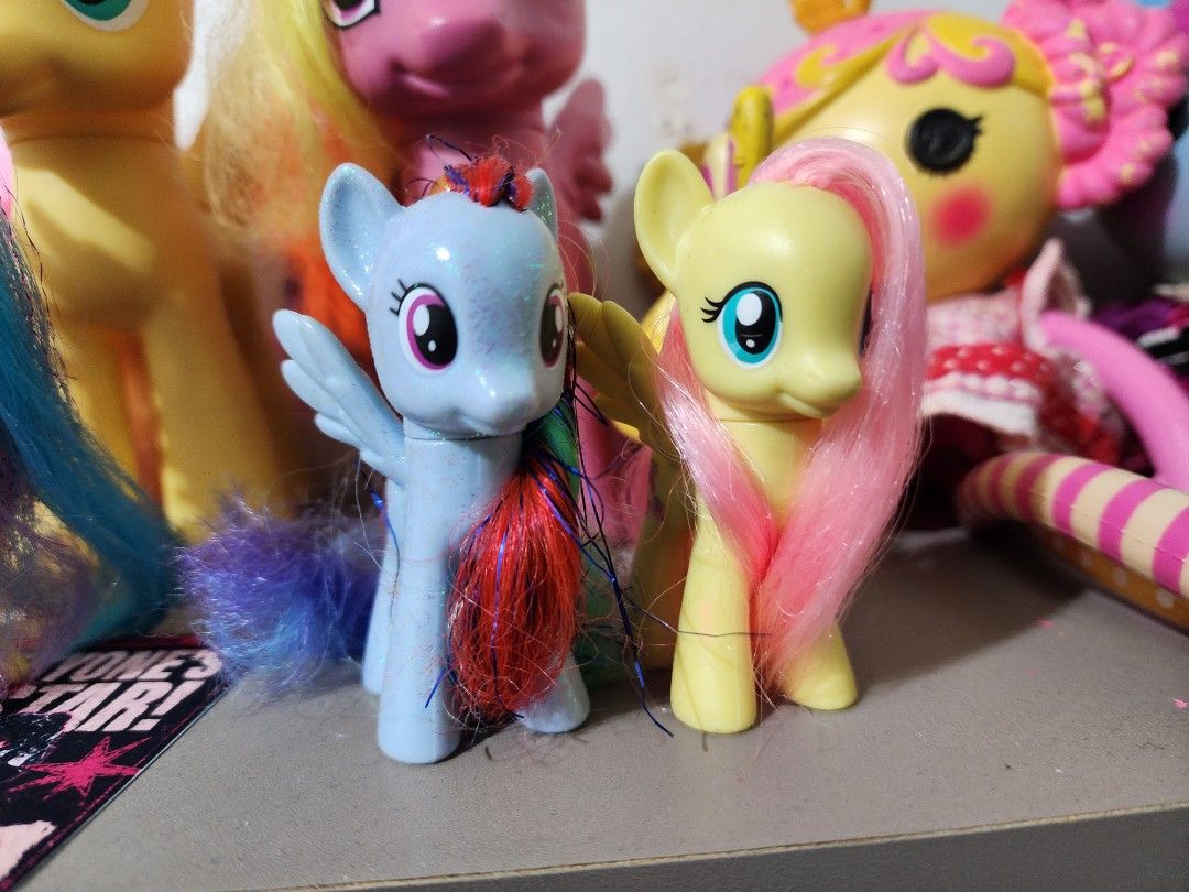 Rainbow Dash MLP My Little Pony (Category: Kids Toys) located in Manila. Submitted by rensyu (Listing ID 1453006154, Image 1). Description: Rainbow Dash: - Frizzy hair + tinsel Fluttershy: SOLD - Cut hair + frizz - Pink spots Will provide more pics if need be. FOR SALE AS A SET IF EACH 230.