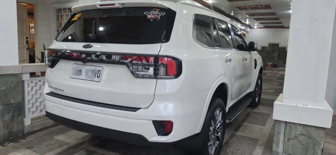 Ford Everest (Category: Used Cars) located in Quezon City. Submitted by brand_bargains (Listing ID 1452984187, Image 3). Description: 2023 Ford Everest Titanium+ 4x2AT 37km original mileage 1st owner Snowflake White Pearl Clean Title Original CR & OR not encumbered Friday Coding Registered until Oct 2026 Loc: North Caloocan near SM Caloocan Price: 1.45M well maintained with complete service receipts and records. Ceramic coated. All stock. No acci