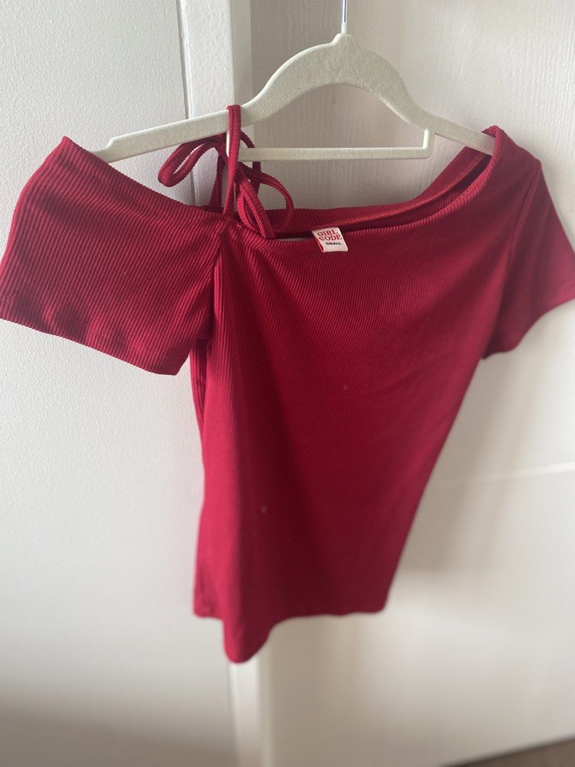 Girlcode Red Off-Shoulder Tie Detail Top Size Small (Category: Blouses) located in Quezon City. Submitted by staysaltyph (Listing ID 1453045091, Image 3). Description: - Girlcode Red Off-Shoulder Top - Ribbed fabric with adjustable tie detail on shoulder - Short sleeves - Size: Small (S) - Condition: Worn once, like new - Perfect for a stylish and flirty look!.