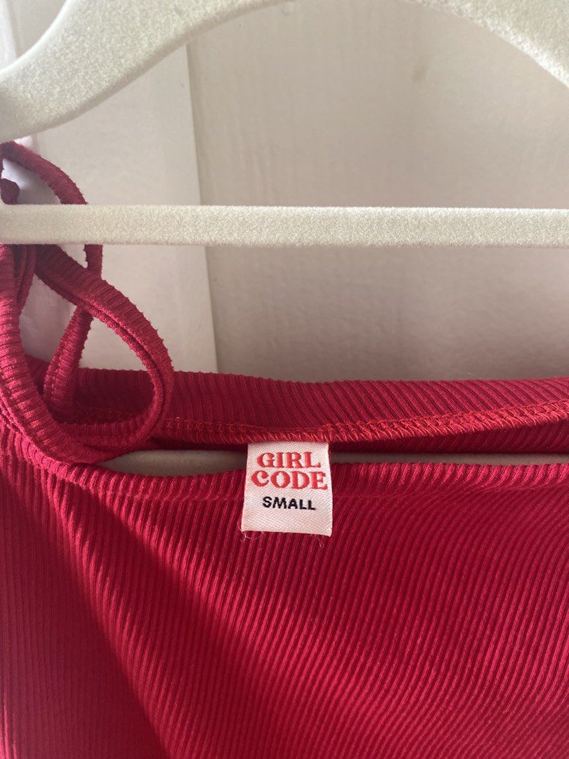 Girlcode Red Off-Shoulder Tie Detail Top Size Small (Category: Blouses) located in Quezon City. Submitted by staysaltyph (Listing ID 1453045091, Image 2). Description: - Girlcode Red Off-Shoulder Top - Ribbed fabric with adjustable tie detail on shoulder - Short sleeves - Size: Small (S) - Condition: Worn once, like new - Perfect for a stylish and flirty look!.
