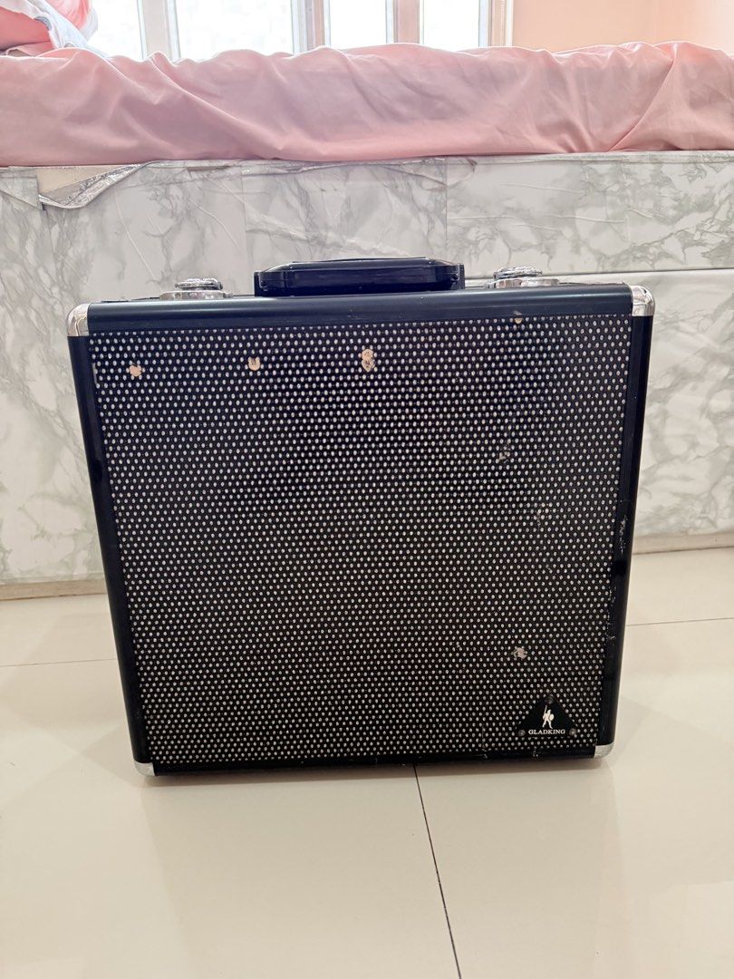GLADKING Professional Makeup Train Case with LED Mirror (Category: Makeup) located in Manila. Submitted by bclzt (Listing ID 1452880729, Image 2). Description: - Sparkly black exterior pattern - Sturdy top handle - Silver trim and clasps - Minor scuffs on side and surface - Ideal for makeup or small item organization - Compact and portable design 💰 Never Used 📍 Binondo, Manila Selling this Gladking Professional Makeup Train Case. It has never b