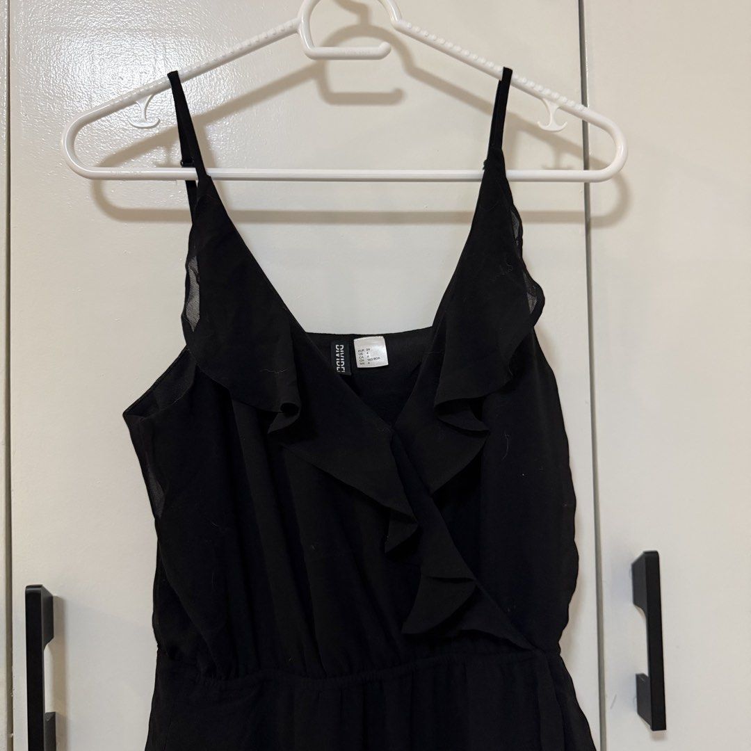 H&M Divided Black Ruffle Strap Dress (Category: Dresses) located in Bulacan. Submitted by declutter_diary02 (Listing ID 1452885922, Image 2). Description: - Brand: H&M Divided - Color: Black - Size: 4 / Small - Style: Spaghetti strap dress - Details: Ruffle detail, adjustable straps, elasticated waist - Skirt: Flowy chiffon PLEASE READ ‼️ MOP: Gcash or Bank transfer MOD: Lalamove/Grab or J&T (pickup only) Pickup time 12 PM ONWARDS Buyer will book