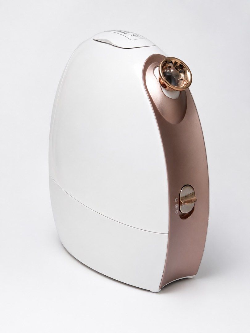 Home Hot and Cold Facial Steamer (Category: Face Care) located in Quezon City. Submitted by kenjixx (Listing ID 1452996355, Image 1). Description: - Facial steamer with water tank - Elegant rose gold accents on nozzle and dial - Multiple settings with icon indicators - Perfect for at-home spa treatments - Simple to operate and maintain - Includes power cord Never used.