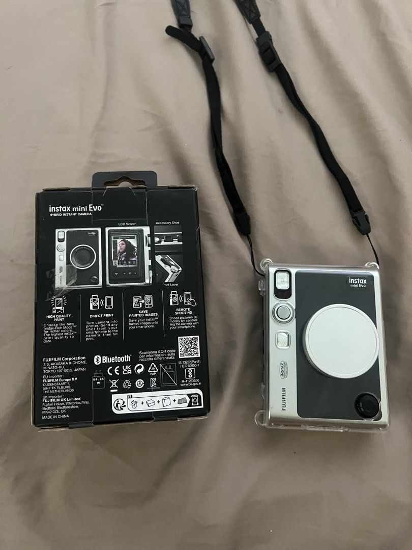 Instax Mini Evo (Category: Cameras) located in Caloocan City. Submitted by princessre28354 (Listing ID 1452934504, Image 1). Description: Selling my Fujifilm Instax Mini Evo in excellent condition! # Inclusions: V Fujifilm Instax Mini Evo Camera V Original Box V 32GB SD Card V Lens Cover V Camera Strap V Clear Protective Case Details: • Purchased in 2026 • Excellent condition • 100% working, no issues • Well-maintained with minimal signs of use •