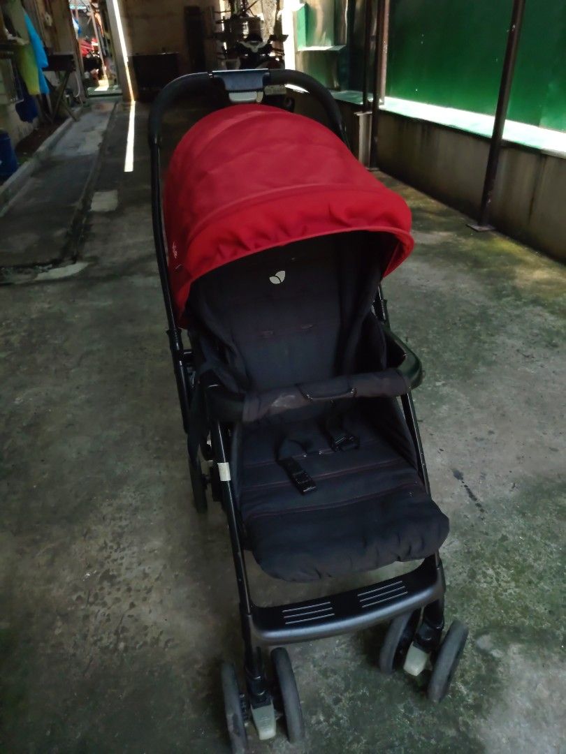 Joie Stroller Red/Black (Category: Strollers) located in Manila. Submitted by mysticrabbit_55b0be (Listing ID 1452947022, Image 2). Description: - Joie stroller in stylish red and black. - Effortless to maneuver for smooth rides. - Features a secure 5-point harness for child safety. - Canopy offers ample shade from the sun. - Conveniently folds for easy storage. - Perfect for everyday outings and travel. - Note: Slight scratches You clean it befo