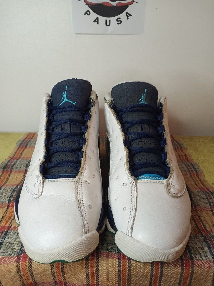 Jordan 13 Low Hornets sz 8.5 (Category: Sneakers) located in General Santos City (Dadiangas). Submitted by michaelmp2026 (Listing ID 1452895652, Image 2). Description: - Authentic Jordan 13 Low Hornets - Size: US 8.5 - Colorway: White, Navy Blue, with Teal accents - Classic low-top silhouette - Perfect addition for any sneaker collection - Price: PHP 2,000.