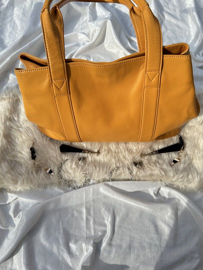 Kitamura Leather Tote Bag (Mustard Yellow) (Category: Tote Bags) located in Manila. Submitted by jaimes05 (Listing ID 1453032868, Image 1). Description: - Authentic Kitamura Japan - Premium leather tote bag - Minimalist and versatile design - Signature “K” logo with spacious interior.