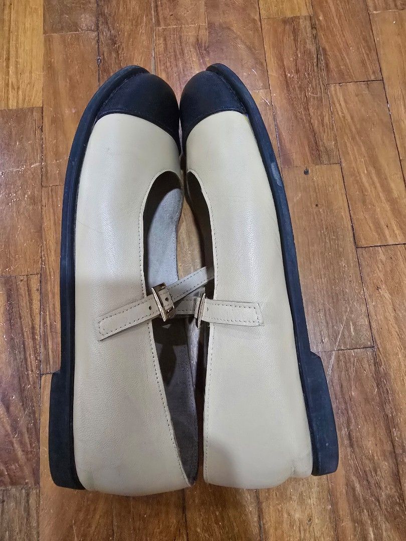 Leather Mary Jane Flats with Buckle Strap (Category: Flats & Sandals) located in Paranaque City. Submitted by poandamum (Listing ID 1452933781, Image 3). Description: For sale: Well used stylish cream and black cap-toe Mary Jane flats. Genuine leather interior for comfort and durability. RFS: It's too big for my feet after I lost weight. There is some leather fraying at rhe stitches on the back and some scuff marks on the leather. There is also a