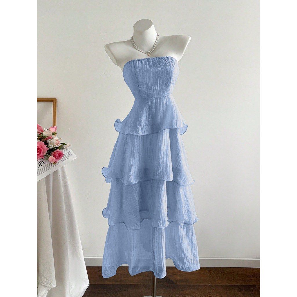 Light Blue Tiered Strapless Maxi Dress (Category: Dresses) located in Cavite. Submitted by isi____ (Listing ID 1453029195, Image 1). Description: - light blue strapless maxi dress - tiered, ruffled design all the way down - light and flowy fabric - worn once sa wedding 🩵.