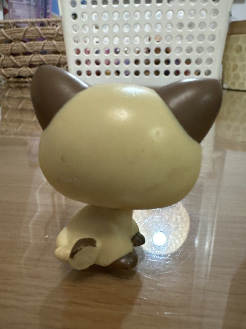 Littlest Pet Shop Siamese Cat Toy (Category: Kids Toys) located in Pasig City. Submitted by acffashion31 (Listing ID 1452960814, Image 3). Description: - Adorable LPS Siamese cat toy - Features big blue eyes and brown ears - Sits in a cute, collectible pose - Ideal addition for any LPS collector - Ready for a new loving home.