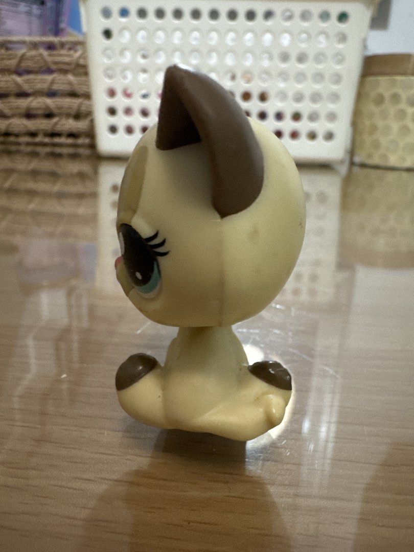 Littlest Pet Shop Siamese Cat Toy (Category: Kids Toys) located in Pasig City. Submitted by acffashion31 (Listing ID 1452960814, Image 2). Description: - Adorable LPS Siamese cat toy - Features big blue eyes and brown ears - Sits in a cute, collectible pose - Ideal addition for any LPS collector - Ready for a new loving home.