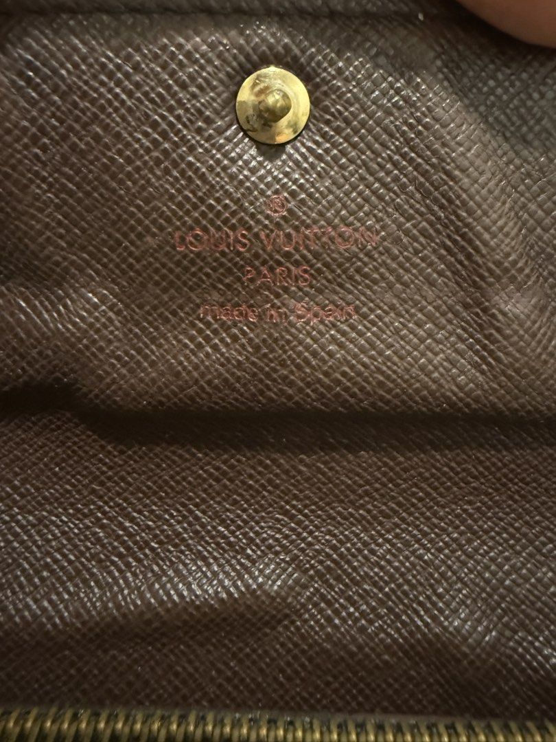 Louis Vuitton Damier Ebene Canvas Wallet (Category: Luxury Bags & Wallets) located in Quezon City. Submitted by aaathrifts (Listing ID 1452981680, Image 3). Description: - Authentic Louis Vuitton wallet - Damier Ebene canvas with classic checkered pattern - Multiple card slots - Zippered coin pocket - Made in Spain - Includes original Louis Vuitton box.