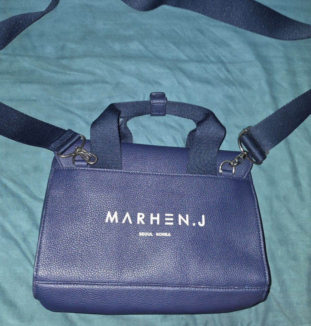 MARHEN.J Ludy bag (Category: Luxury Bags & Wallets) located in Quezon City. Submitted by preloveditems.qc (Listing ID 1453017744, Image 2). Description: MARHEN.J Ludy Bag Color navy *slight issue: removed stitch on corner but still intact* SRP IN Shpee 7400php or in website $160usd MADE IN KOREA PRODUCT DETAILS ⁃ Has a 2-way adjustable strap so the bag can be worn as a crossbody or handbag - Has a back pocket and inner pockets ⁃ Has a flap to kee