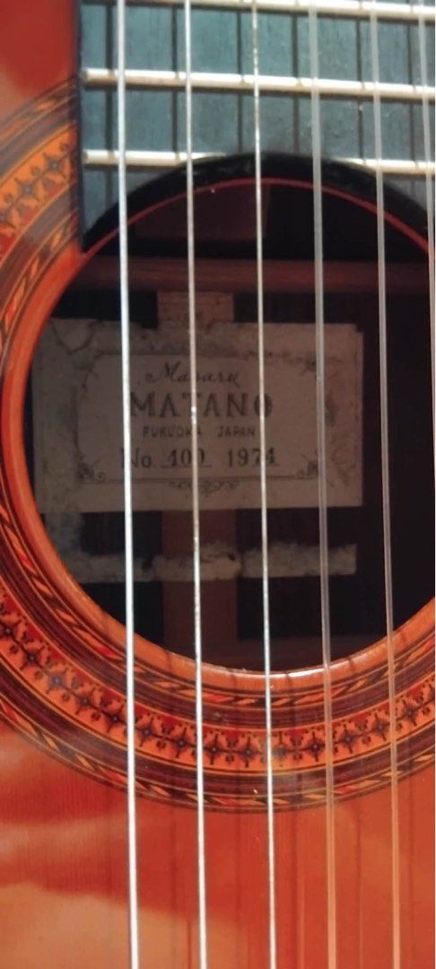 Masaru Matano Classical Guitar (1974) (Category: Musical Instruments) located in Manila. Submitted by sunyam18 (Listing ID 1452884651, Image 3). Description: - Vintage Masaru Matano Classical Guitar - Origin: Fukuoka, Japan - Type: Nylon String - Features: Beautiful wood grain on back and sides - Ideal for: Collectors or players seeking a classic sound This vintage instrument offers the rich, warm tone and resonance that only naturally aged wood 