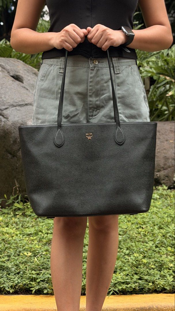MCM TOTE BAG (Category: Luxury Bags & Wallets) located in Manila. Submitted by jasminsant59850 (Listing ID 1453033468, Image 2). Description: Orig MCM BAG Size: Medium Color black.