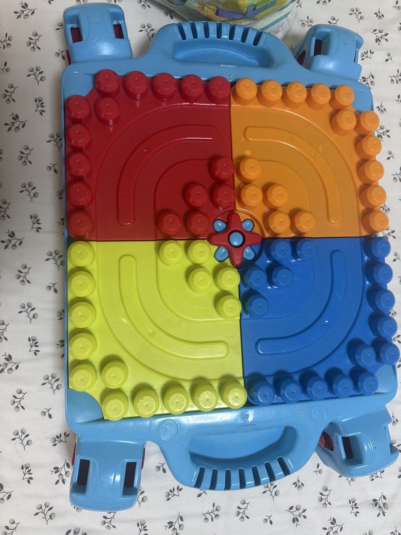 Mega blocks (Category: Lego & Building Sets) located in Singapore. Submitted by ksoni (Listing ID 1452885279, Image 2). Description: Mega blocks table and a bag of extra mega blocks to show more creativity .