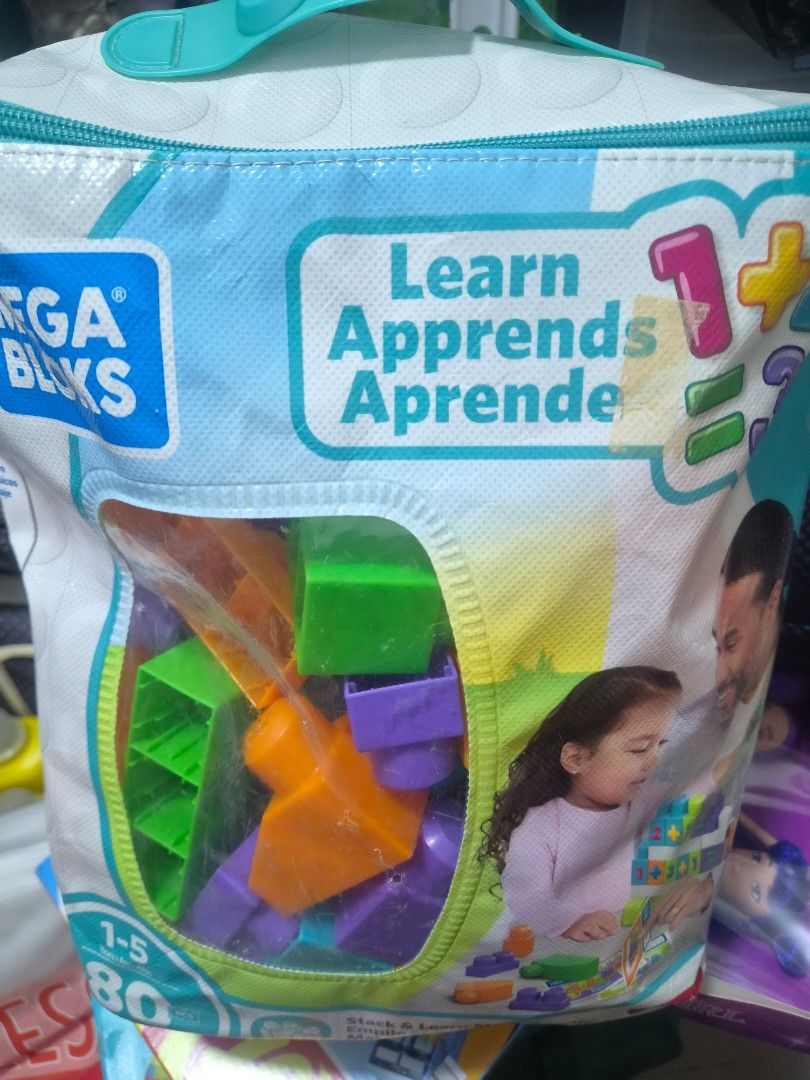 Mega blocks (Category: Educational & Learning Toys) located in Singapore. Submitted by stothem (Listing ID 1453004757, Image 1). Description: - Mega Bloks building set - 80 pieces included - Vibrant colors: green, orange, purple - Comes in a durable zippered storage bag - Encourages learning and imaginative play - Suitable for ages 1-5.