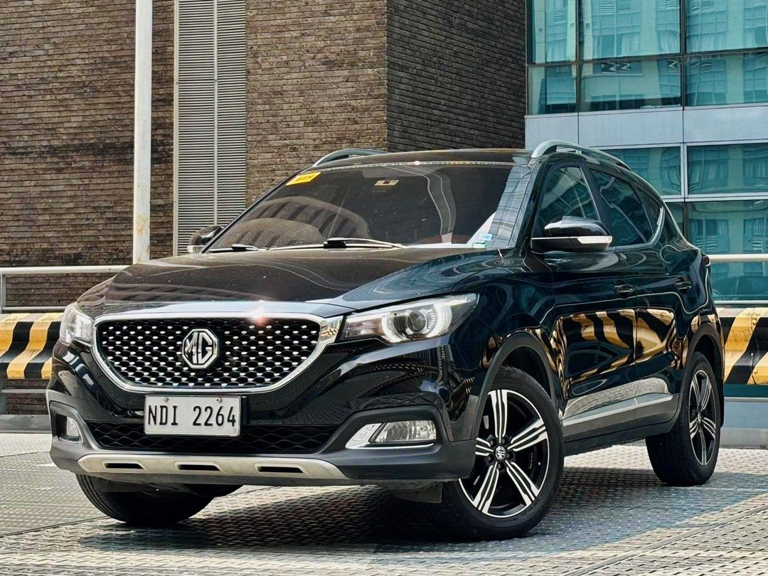 MG ZS (Category: Used Cars) located in Makati City. Submitted by maby_latido05 (Listing ID 1452948190, Image 2). Description: 2019 MG ZS 1.5 Alpha AT Gas‼️🔥 30% Cash Out: 78K ALL IN 4 yrs: Php 17,191 3 yrs: Php 20,731 2 yrs: Php 28,693 FREE Transfer of Ownership FREE Detailing interior & Exterior Detailing ✅ 39K mileage only ✅ Well Maintained ✅ Updated PMS ✅ Updated Registration ✅ Feature: 1.5L DOHC Gasoline Engine 8-inch Touchscreen Apple CarPl