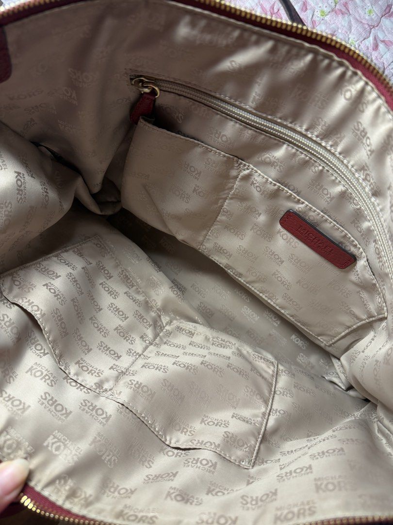 Michael Kors Charlotte Large Tote Bag (Dark Cherry) (Category: Tote Bags) located in Paranaque City. Submitted by bbubbi (Listing ID 1452929330, Image 2). Description: — price is negotiable. — burgundy pebbled leather tote bag, 9/10 condition. — gold-tone hardware, multiple interior pockets for organization, includes iconic Michael Kors charm. — quiet luxury. could fit a 15.6inch laptop. — 2nd hand bag from Japan. 💵 mop: gcash / gotyme 📦 mod: l