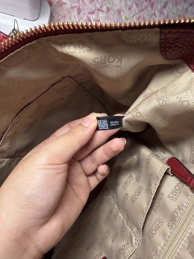 Michael Kors Charlotte Large Tote Bag (Dark Cherry) (Category: Tote Bags) located in Paranaque City. Submitted by bbubbi (Listing ID 1452929330, Image 3). Description: — price is negotiable. — burgundy pebbled leather tote bag, 9/10 condition. — gold-tone hardware, multiple interior pockets for organization, includes iconic Michael Kors charm. — quiet luxury. could fit a 15.6inch laptop. — 2nd hand bag from Japan. 💵 mop: gcash / gotyme 📦 mod: l