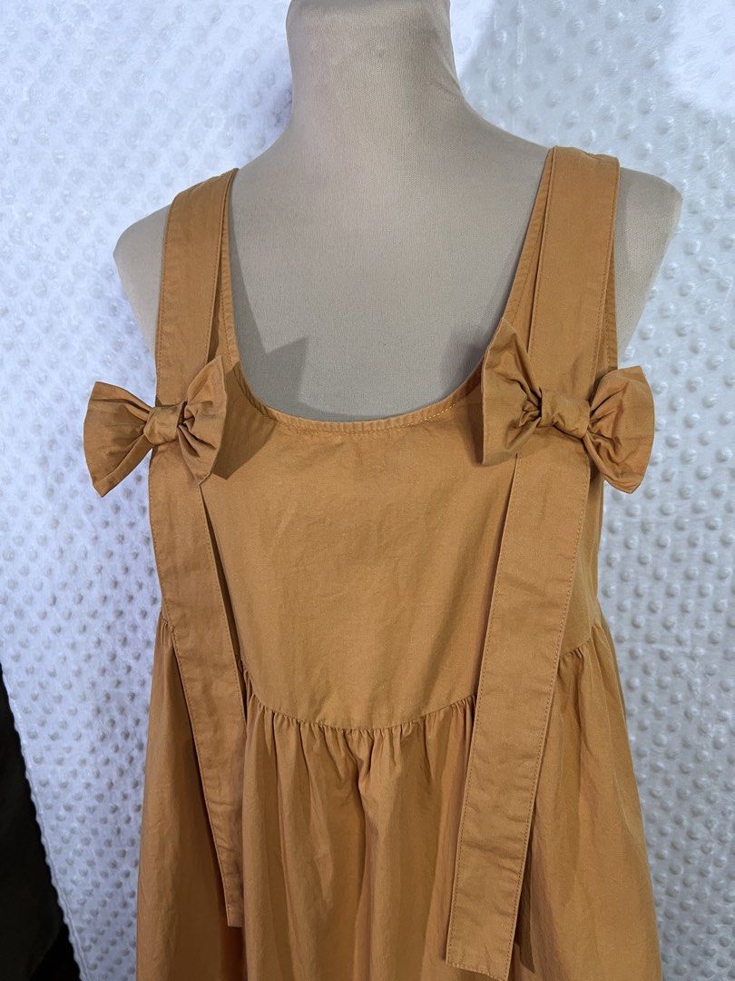 Mustard bow detail dress (Category: Dresses) located in Quezon City. Submitted by mondaymayhem (Listing ID 1453033200, Image 2). Description: 658) fits small-med 🚚j&t(payment first) ☑️same day delivery(lalamove/grab) 📍Batasan hills QC No refund/return/exchange. All sales are final! Strictly no cancellation/changing of orders Items are thrifted so please manage your expectations. Color may slighly differ due to lighting. Make sure of your size. 