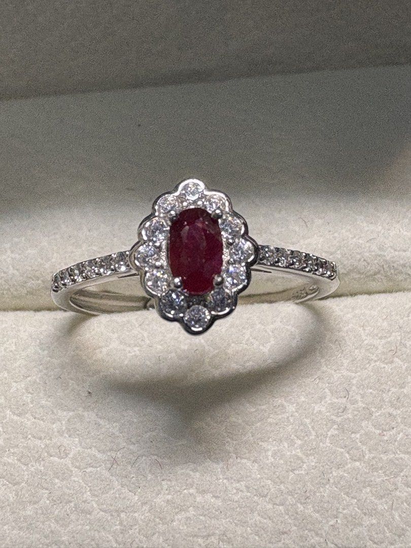 Natural Ruby Ring (Category: Rings) located in Singapore. Submitted by Discoverme (Listing ID 1453013798, Image 2). Description: ❤️ Natural Ruby Ring ❤️ Timeless Natural Ruby elegantly set in S925 sterling silver, surrounded by a dazzling halo of sparkling accent stones. A classic and sophisticated design that never goes out of style. Includes a gemstone identification certificate. Perfect for gifting or adding a touch of elegance to any jeweller