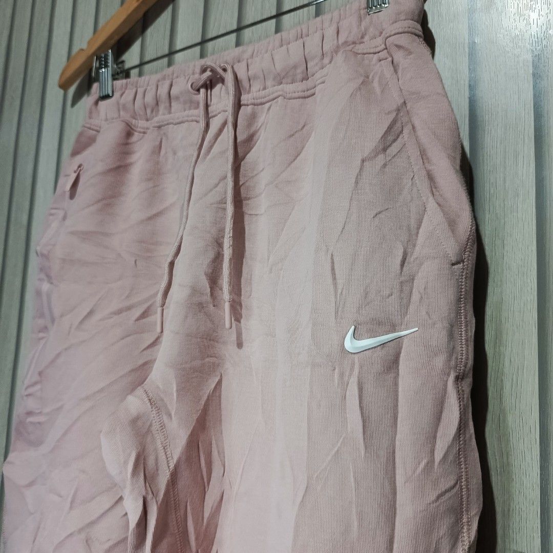Nike Pink Sweatpants Joggers (Category: Joggers) located in Manila. Submitted by gbryanrave27905 (Listing ID 1453034661, Image 3). Description: NIKE X NOCTA TECH FLEECE OPEN HEMS MENS 📌 Elastic waistband with drawstring 📌 Pockets included 📌 Small Nike logo on the side 📌 Additional small logo on the back pocket area 📌 Comfortable and casual design 📌 Ideal for lounging or workouts 📌ISSUE NONE 📌COLORRATE 10/10 📌READY TO WEAR 📌EXCELLENT CON
