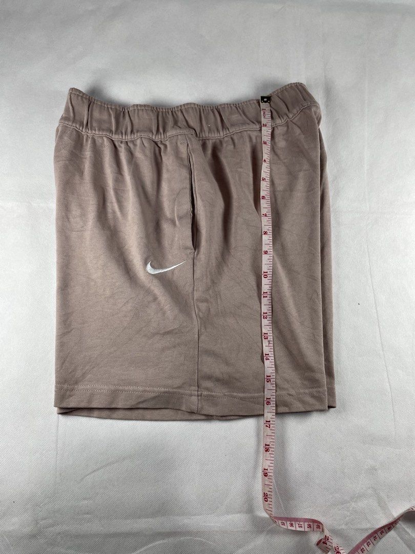 Nike Sportswear Jersey Short (Category: Shorts) located in Bacolod City. Submitted by maxpeynthrift (Listing ID 1453028538, Image 2). Description: Size Medium W 26 to 34 L 16.5 Excellent condition No issue Fabric: Heavyweight jersey knit construction that feels smooth and premium. Fit: Roomy, loose fit through the seat and thighs for relaxed daily wear. Waistband: Thick, gathered elastic waistband offering comfort without drawcords. Branding: Sma