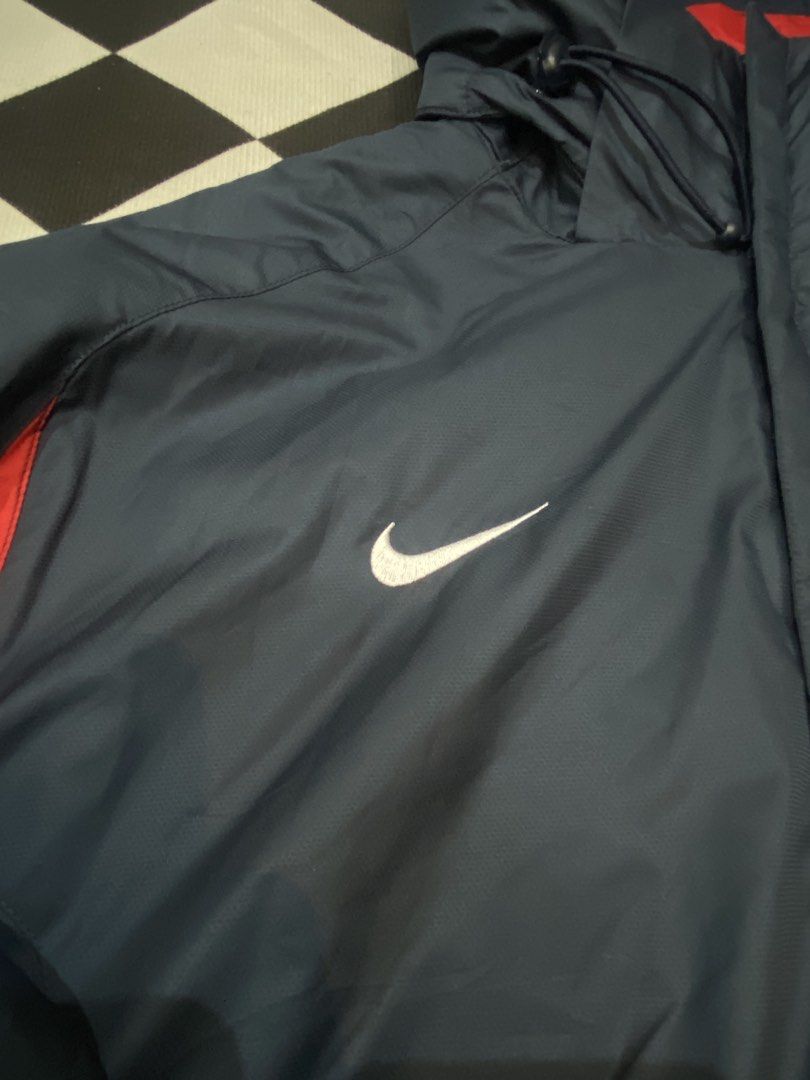 Nike Total 90 Fit Hooded Jacket Navy Red (Category: Coats, Jackets and Outerwear) located in Manila. Submitted by salaspasio80393 (Listing ID 1452896048, Image 2). Description: - Nike Total 90 Jacket - Color: Navy Blue with Red Accents - Features a Hood with Drawstrings - Nike Fit Technology - Zipper Closure - Ideal for Sports or Casual Wear.
