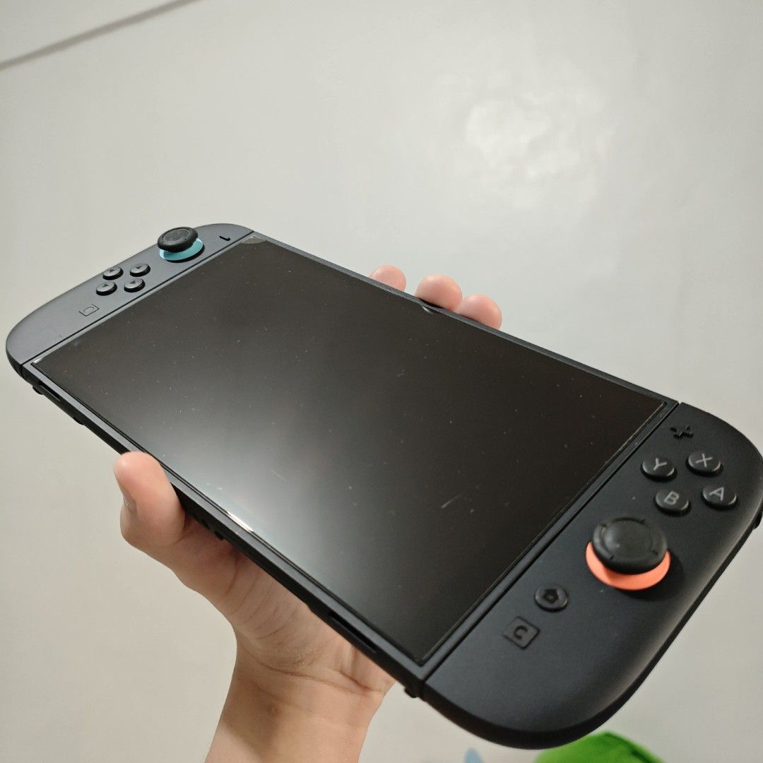 Nintendo Switch 2 Console with Mario Kart 8 Deluxe (Category: Nintendo) located in Manaoag. Submitted by kateeoxiiety (Listing ID 1452934179, Image 2). Description: - Nintendo Switch Console - Original Box Included - Original Dock Included - Original Joy-Cons Included - Mario Kart 8 Deluxe Game Included - 232 GB System Memory Free Space - Control Sticks Calibrated - All Items in Good Working Order.