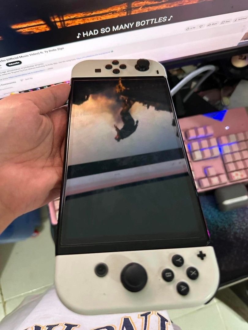 Nintendo Switch oled (Category: Nintendo) located in Manila. Submitted by em_mmmm (Listing ID 1453047017, Image 3). Description: slightly used due to work -charger -dock -skull & co neo grip -carrying case -zelda botw -hogwarts legacy .